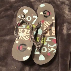 Guess wedge flip flops!